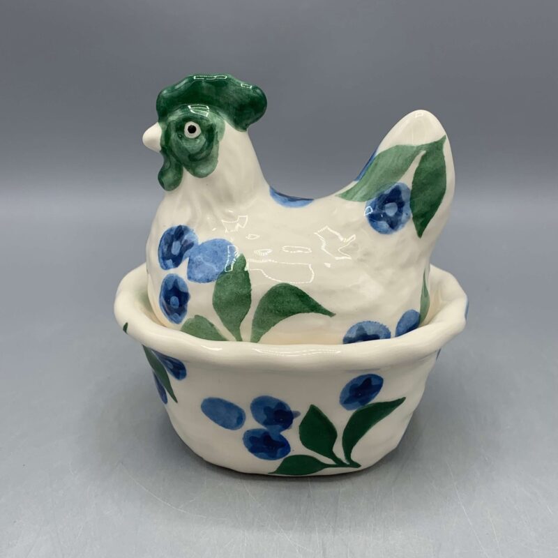 Small Hen on Nest Blueberries